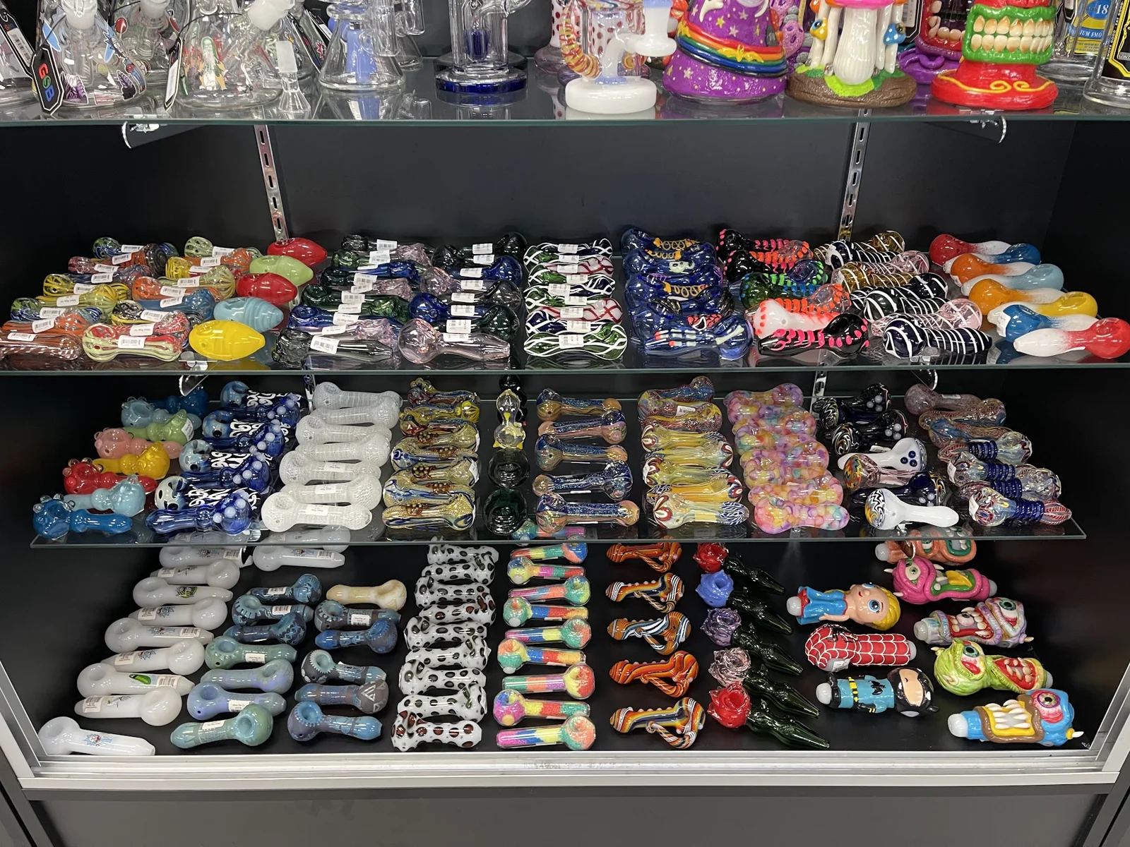 Glass pipe display at Infinity Smoke Shop in Miami